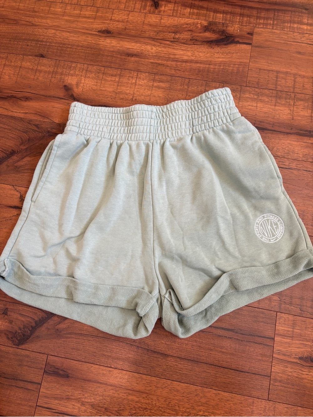 Nike Women’s High Waisted Sweat Shorts Green Sage Circular Logo Pocket Small